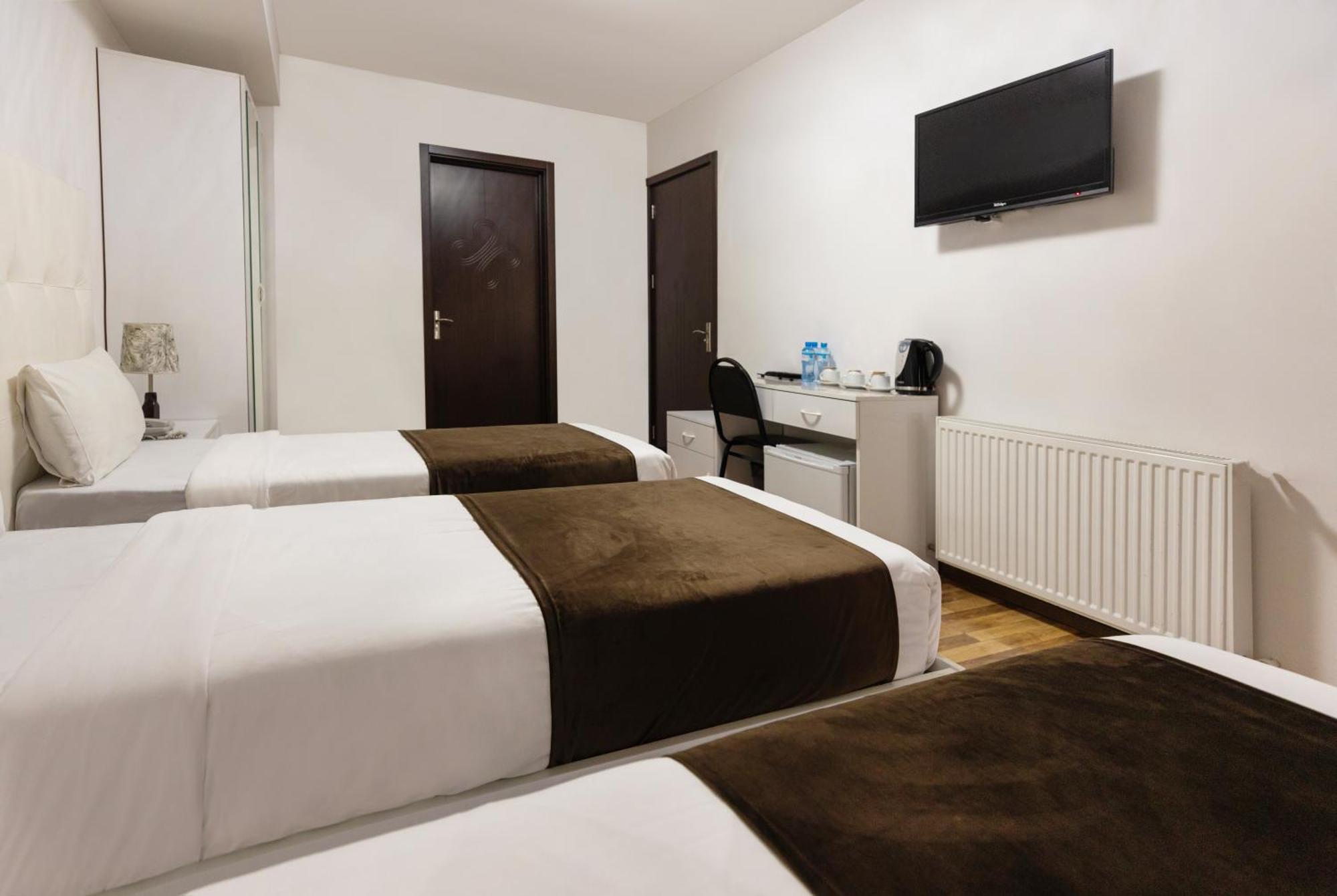 Hotel Grand Palace Tiflis Habitación foto